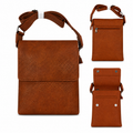 Brown leather crossbody bag with strap on a white background