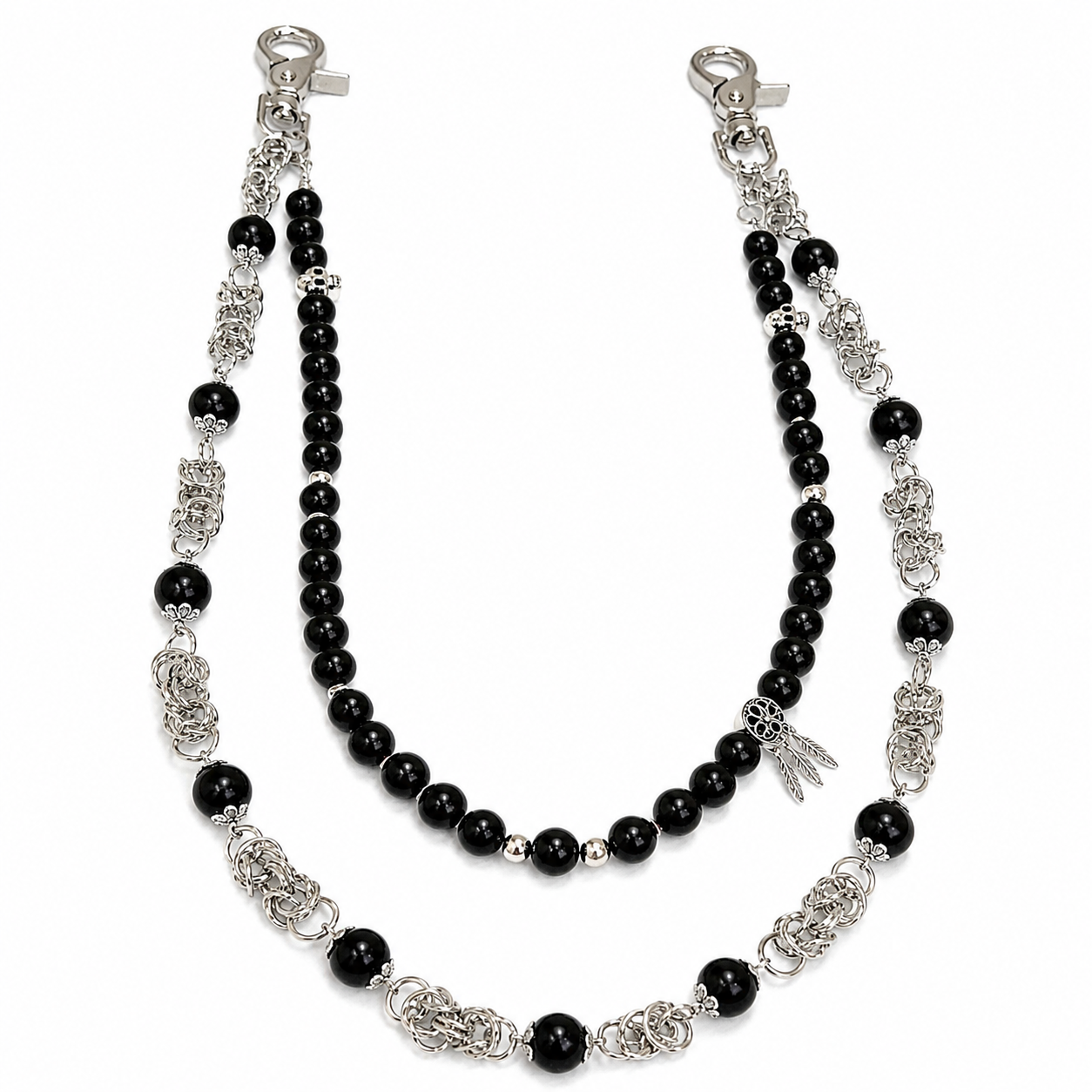 Black beaded necklace with silver chain on a white background