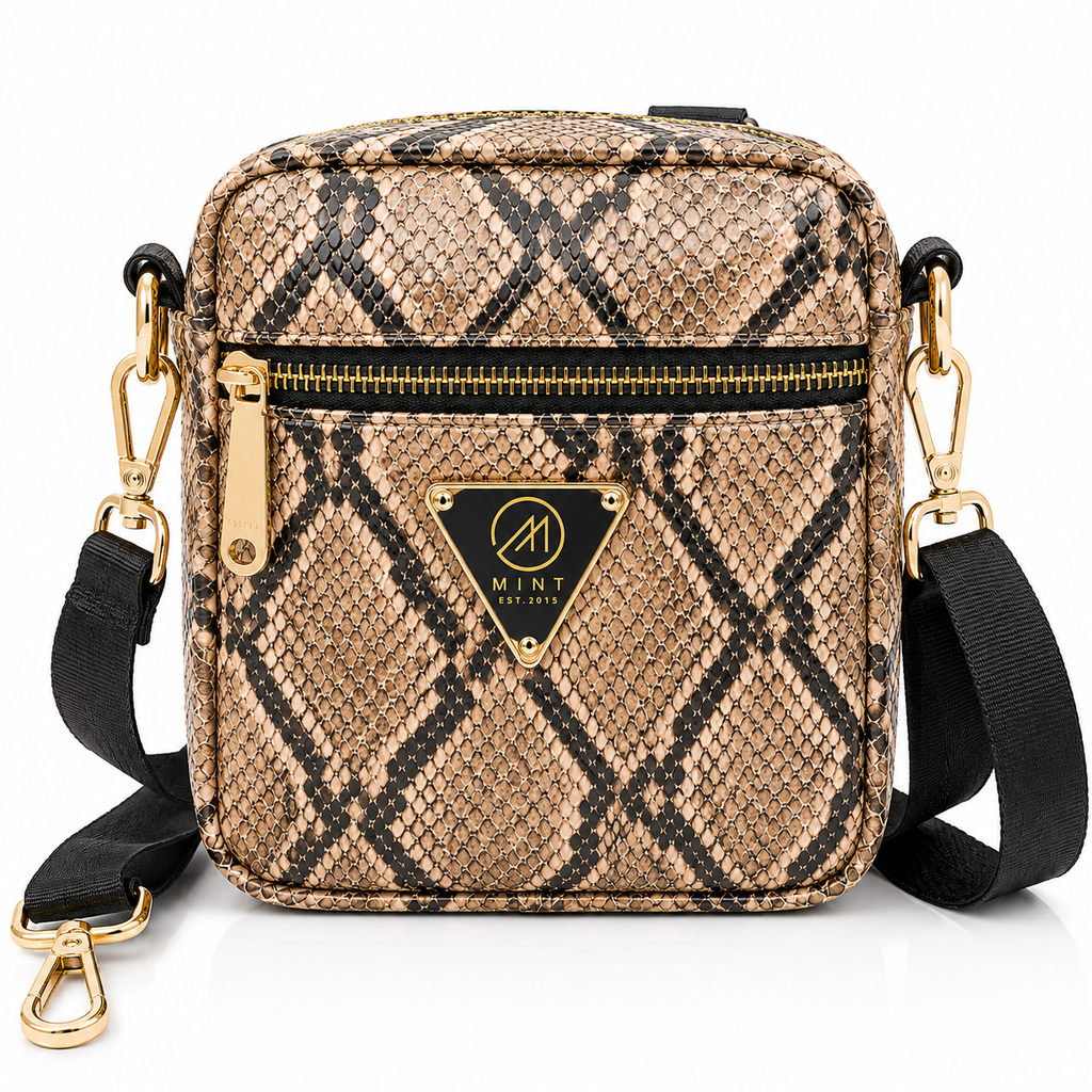 Patterned crossbody bag with gold accents on a white background