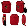 Red quilted crossbody bag with gold zipper and black strap on a white background
