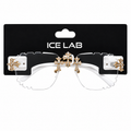White sunglasses with gold decorative elements on a black Ice Lab packaging