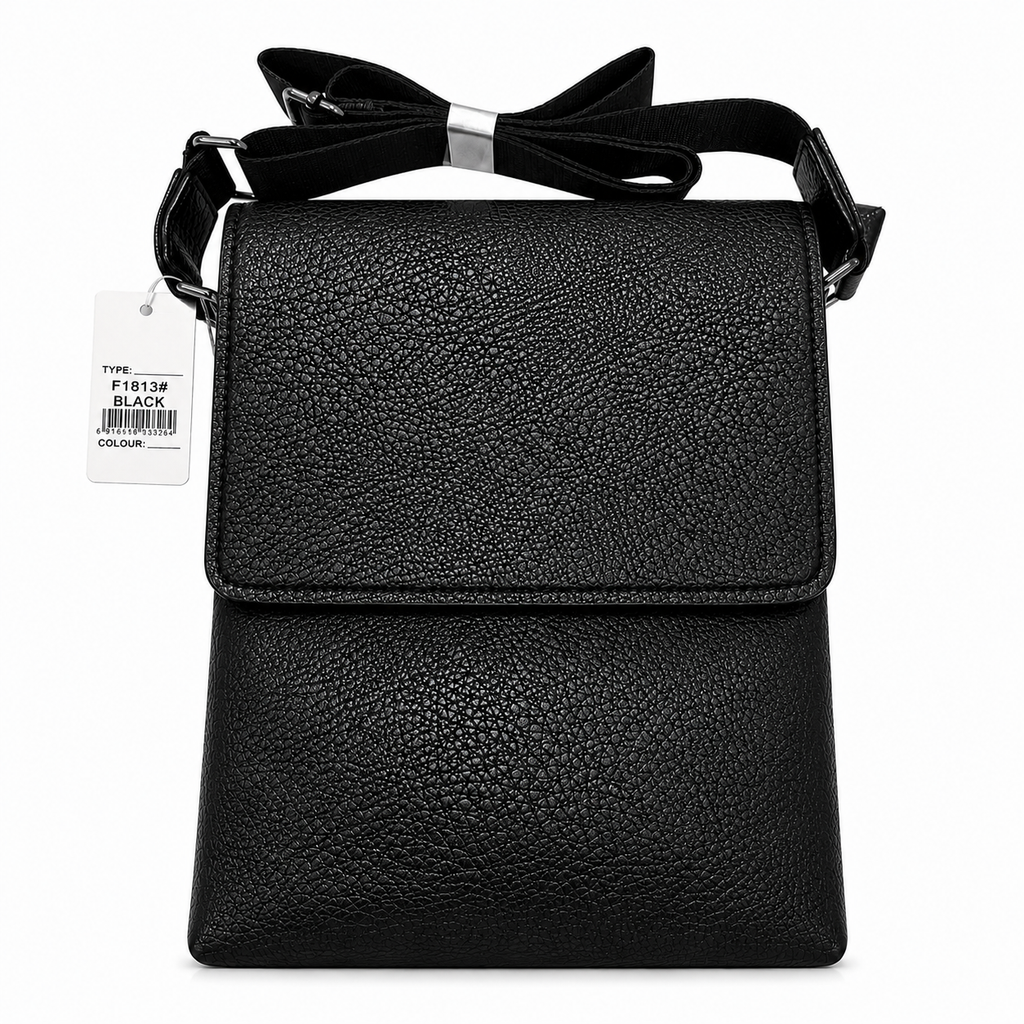 Black leather crossbody bag with a bow on a white background
